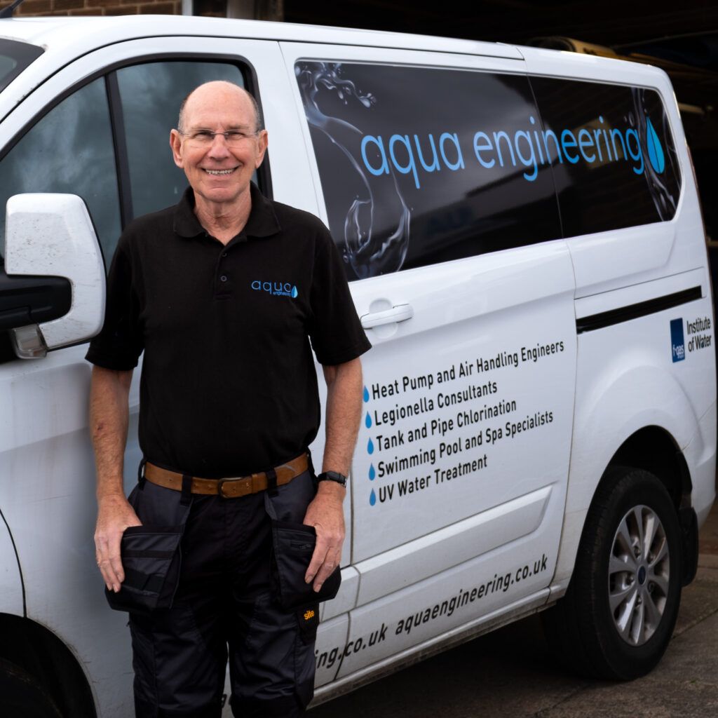 Tony Martlew, swimming pool and water treatment engineer at Aqua Engineering, pictured here beside his company van.