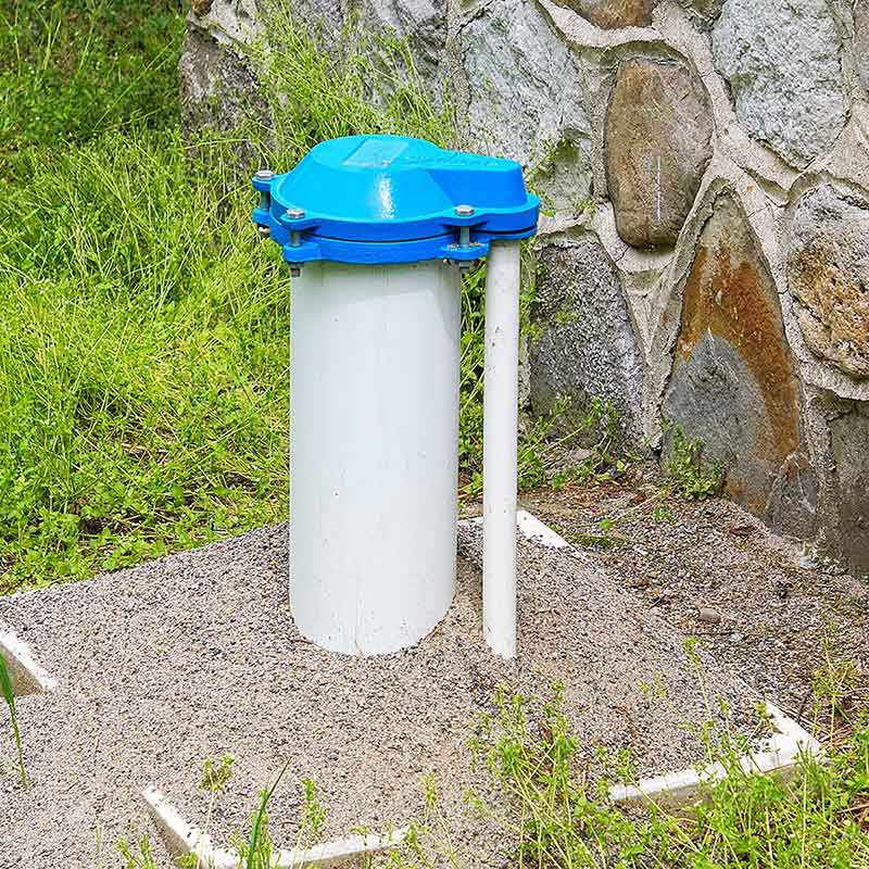 External casing and cap of a private home water well